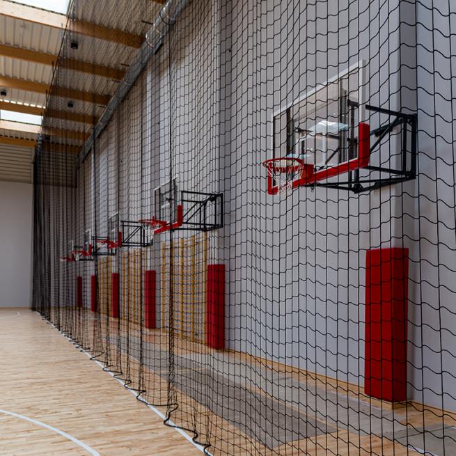 Constructions for mounting and electric sliding ball catching nets