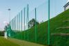 OUTDOOR BARRIER NETTING MOUNTED ON STEEL POSTS